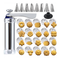 Cookie press with20original discs and8piping tips on white