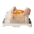 Original White bread slicing guide with loaf and hand demonstration on white