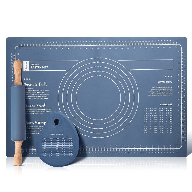 Original blue pastry mat, rolling pin and scraper on a white background