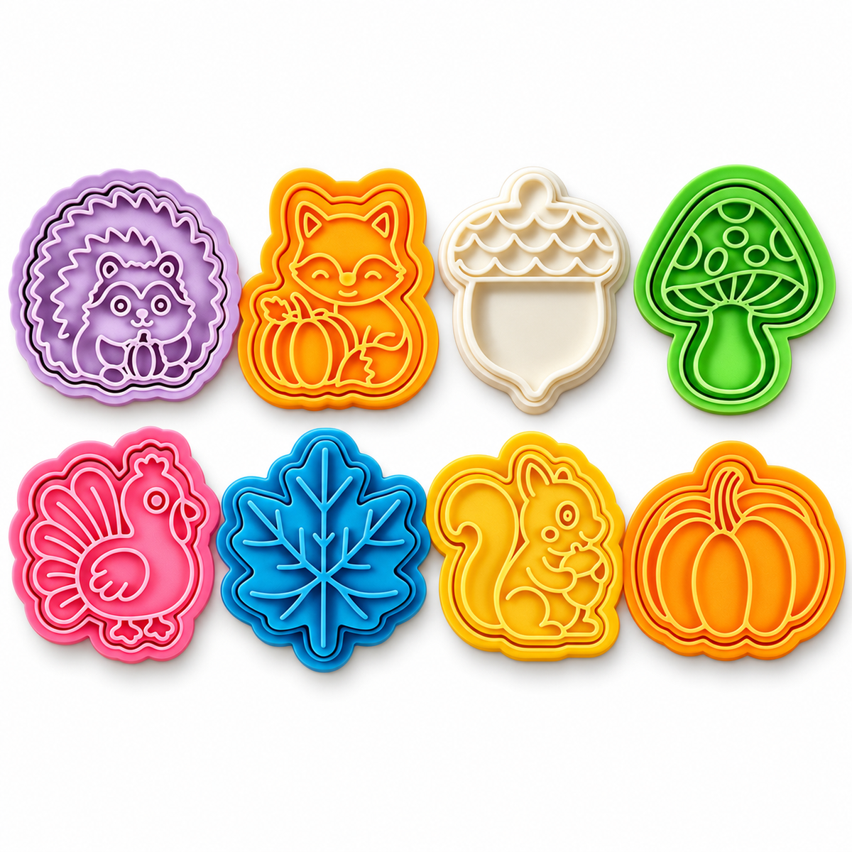 Eight representative autumn cookie stamp designs on white